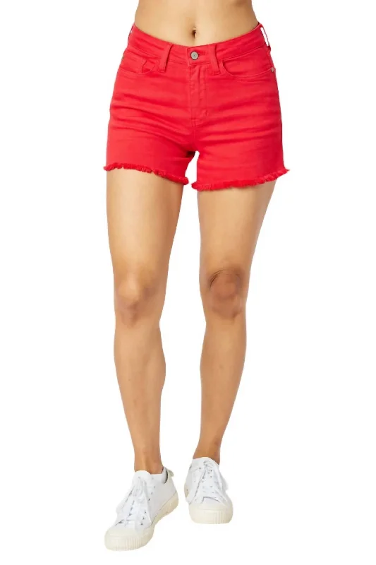 Mid Rise Garment Dyed Fray Hem Shorts In Red